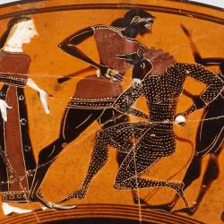 Theseus slays the Minotaur with Ariadne looking on